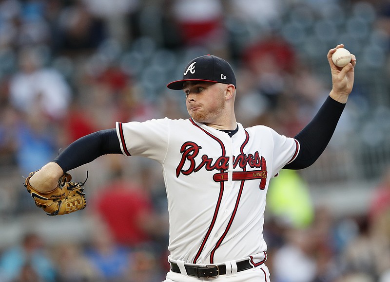 Atlanta Braves starting pitcher Sean Newcomb works against the Washington Nationals during the first inning of a baseball game Thursday, May 31, 2018, in Atlanta. (AP Photo/John Bazemore)