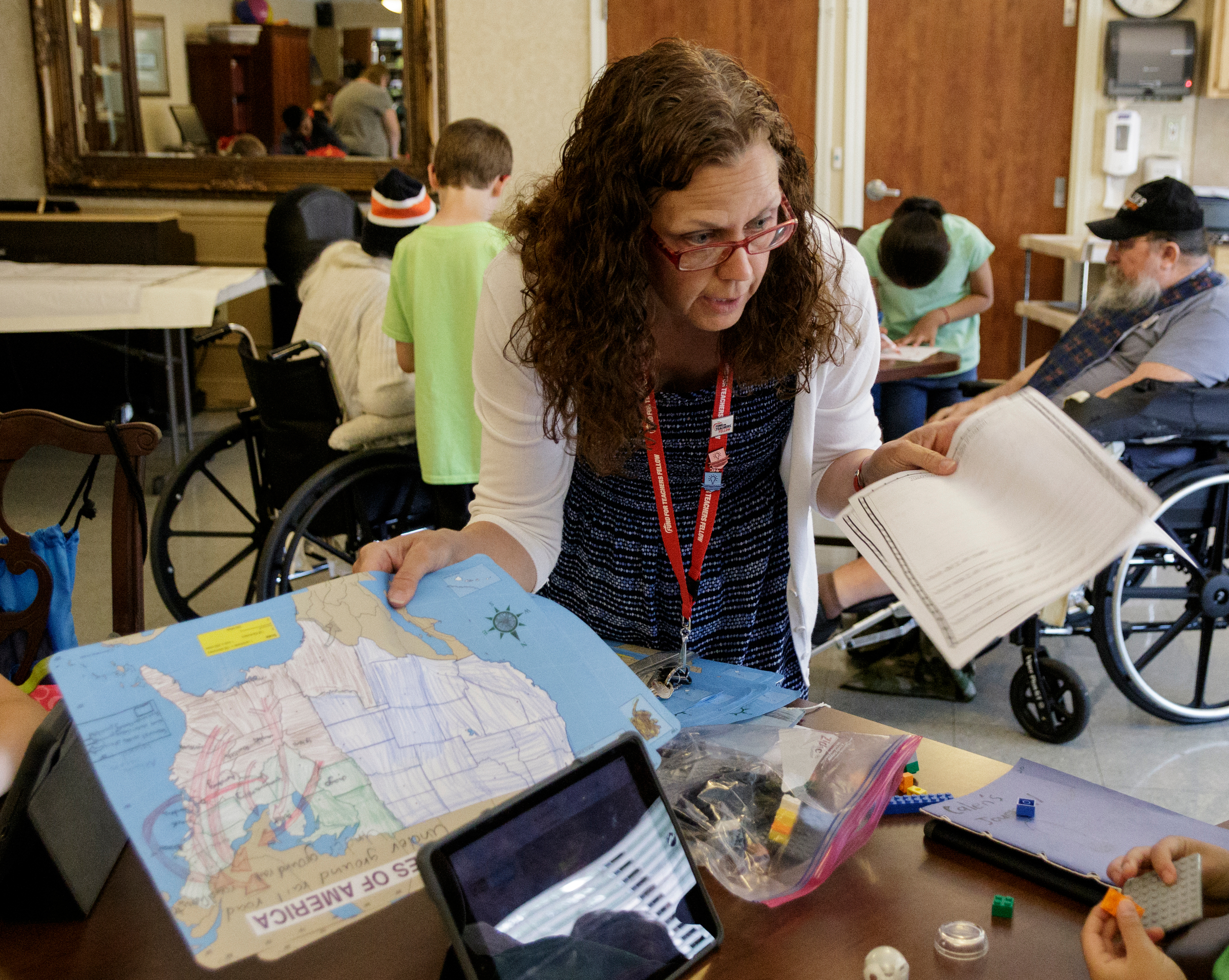 Teacher Beth Wilson keeps students on task during an outing to Life Care Center of Red Bank on Tuesday, May 15, 2018, in Red Bank, Tenn. Wilson takes her class for active learning activities at the senior care facility.