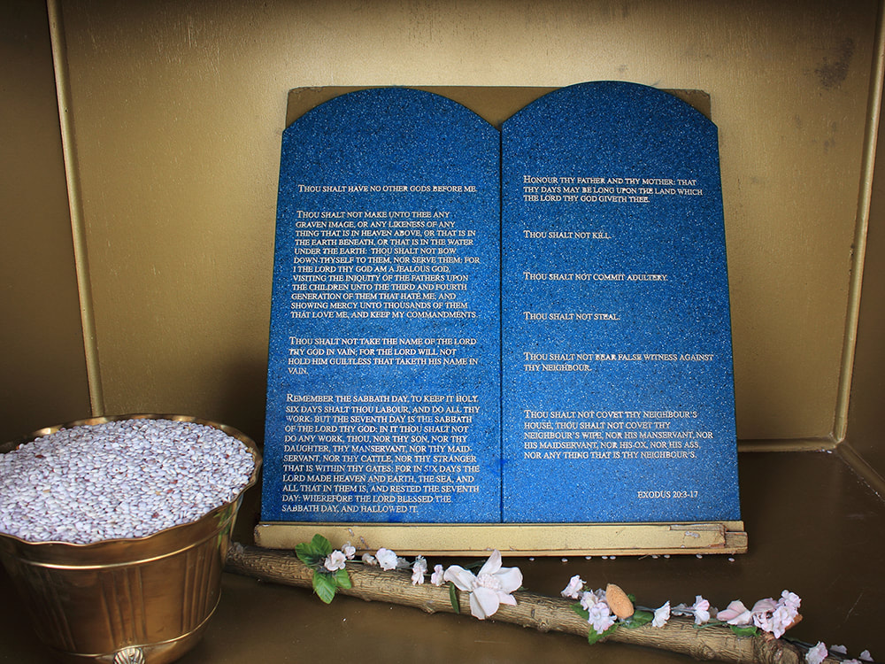 After throwing down, and breaking, the first 10 Commandment stones written by God, Moses had to write the new testimony on two tables of stone under God's direction on Mount Sinai. (Exodus 34:1-9; 27-28)