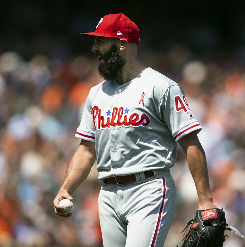 
              Philadelphia Phillies starting pitcher Jake Arrieta (49) reacts after giving up an infield single to San Francisco Giants Alen Henson during the sixth inning of a baseball game, Sunday, June 3, 2018, in San Francisco. The Giants won 6-1. (AP Photo/D. Ross Cameron)
            
