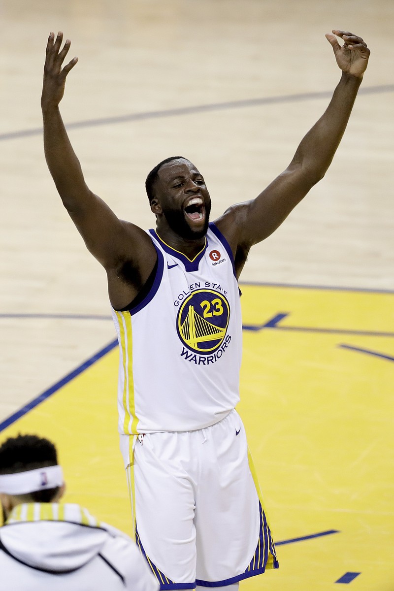 
              Golden State Warriors forward Draymond Green, celebrates during overtime of Game 1 of basketball's NBA Finals against the Cleveland Cavaliers in Oakland, Calif., Thursday, May 31, 2018. The Warriors won 124-114. (AP Photo/Marcio Jose Sanchez)
            