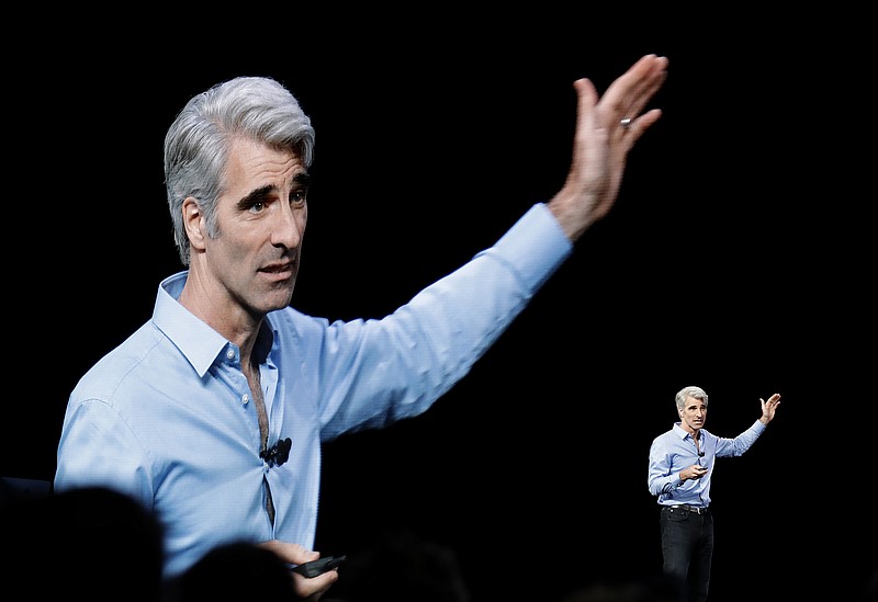 Craig Federighi, Apple's senior vice president of Software Engineering, speaks during an announcement of new products at the Apple Worldwide Developers Conference Monday, June 4, 2018, in San Jose, Calif. (AP Photo/Marcio Jose Sanchez)