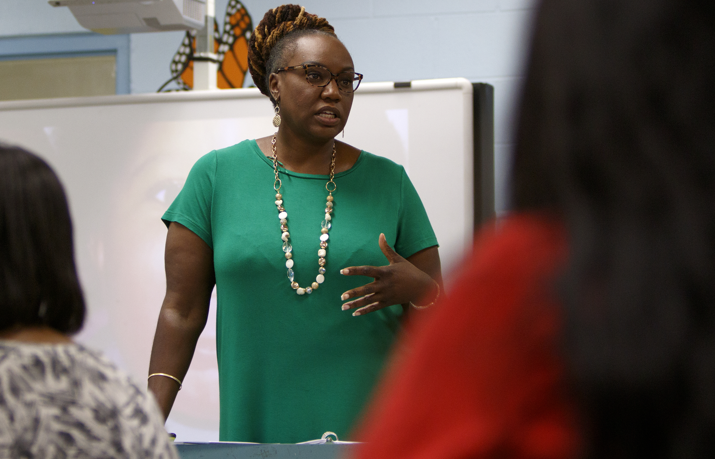 Chattanooga 2.0 volunteer Katherlyn Geter, who is running for the District 5 Hamilton County Commission seat, speaks to parents at Woodmore Elementary School on Monday, June 4, 2018 in Chattanooga, Tenn.