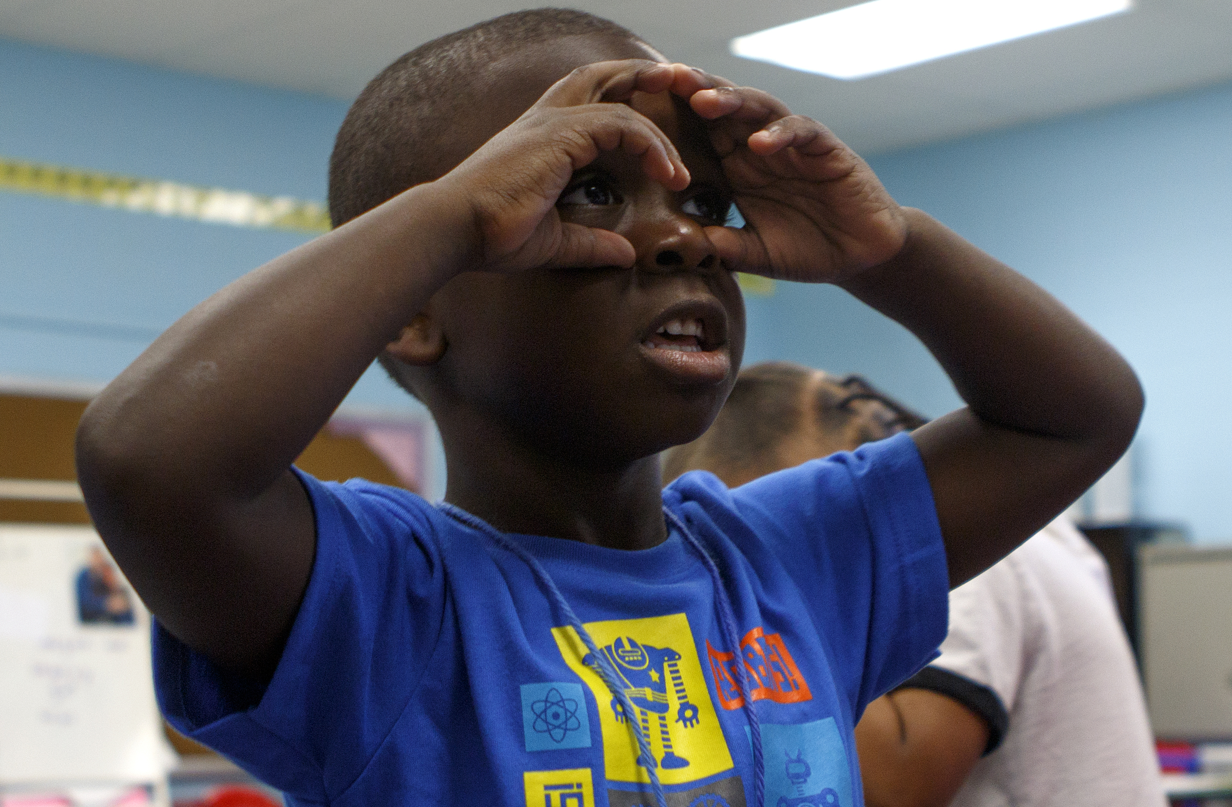 Dominique Davis searches for the letter "L" during Camp K at Woodmore Elementary School on Monday, June 4, 2018 in Chattanooga, Tenn.