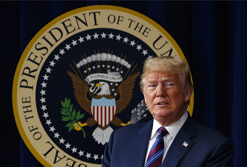 In this May 30, 2018, photo, President Donald Trump arrives for a bill signing ceremony in the South Court Auditorium on the White House campus, Wednesday, May 30, 2018, in Washington. President Donald Trump says he has "absolute right to PARDON myself" but says has "done nothing wrong" in the Russia probe. (AP Photo/Evan Vucci)