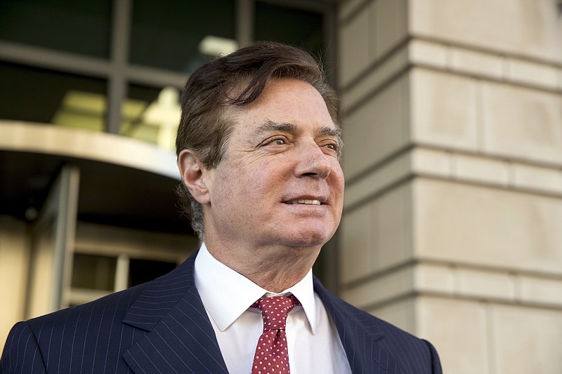 In this Thursday, Nov. 2, 2017, file photo, Paul Manafort, President Donald Trump's former campaign chairman, leaves Federal District Court, in Washington. Prosecutors working for special counsel Robert Mueller are accusing former Trump campaign chairman Paul Manafort of making several attempts to tamper with witnesses in his ongoing criminal cases. Mueller's team says in a new court filing that Manafort and one of his associates made several attempts to contact two witnesses in an effort to influence their testimony while he was on house arrest earlier this year. (AP Photo/Andrew Harnik, File)