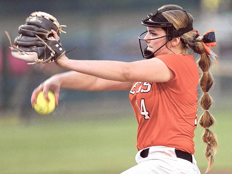 Meigs County's Ashley Rogers (14) winds up to pitch in the final game of the TSSAA Class AA softball championship at the Starplex in Murfreesboro, Tenn. on May 25, 2018.