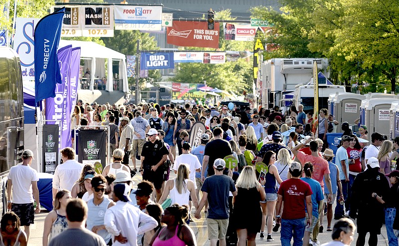 In this June 11, 2017, staff file photo, Riverfront Parkway becomes a midway during the Riverbend Festival. (Staff Photo by Robin Rudd)