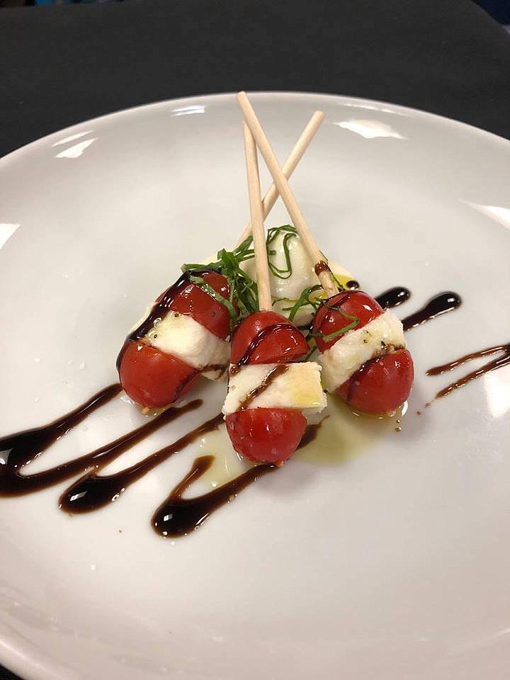 Caprese skewers were offered by Alimentari during the inaugural Out on 8th on June 1. The street party will be held each Friday on Eighth Street through Oct. 5. (Facebook.com)