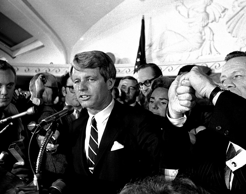 FILE - This June 5, 1968 file photo shows Sen. Robert F. Kennedy speaking at the Ambassador Hotel in Los Angeles, following his victory in the previous day's California primary election. The New York senator was shot just after jubilantly proclaiming victory in California’s Democratic presidential primary election. (AP Photo/Dick Strobel, File)