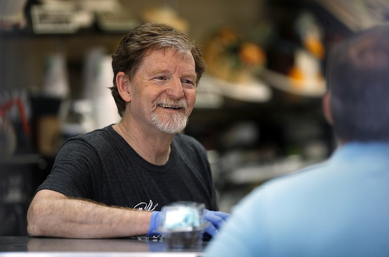 Baker Jack Phillips, owner of Masterpiece Cakeshop, manages his shop Monday, June 4, 2018, in Lakewood, Colo., after the U.S. Supreme Court ruled that he could refuse to make a wedding cake for a same-sex couple because of his religious beliefs did not violate Colorado's anti-discrimination law. (AP Photo/David Zalubowski)