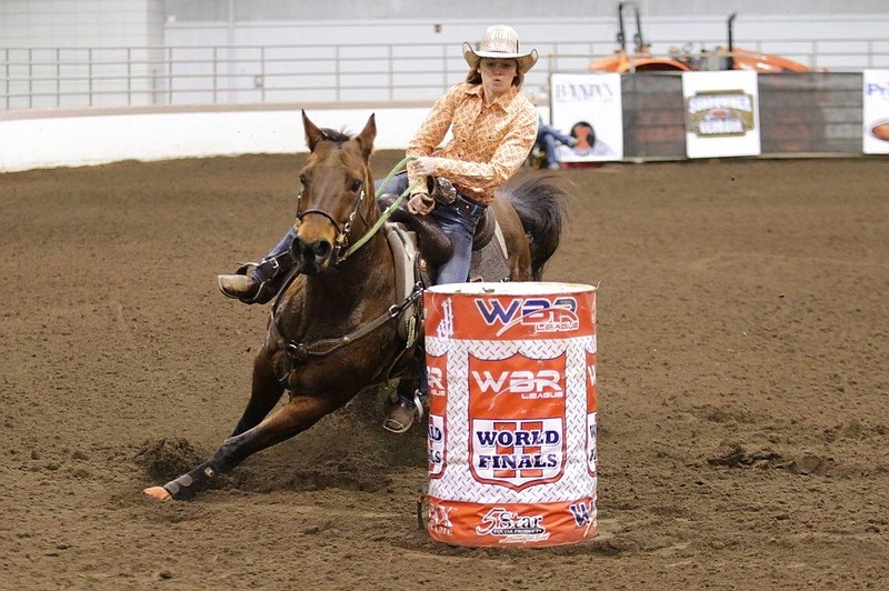 Sierra Holder displays her state-championship barrel racing on her horse Jolene.