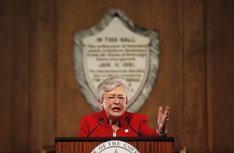 FILE - In this jan. 10, 2018, file photo, Alabama Gov. Kay Ivey gives the annual State of the State address at the Capitol, in Montgomery, Ala. Ivey's campaign is touting in an ad and email to supporters that as governor she signed the largest middle-class tax cut in 10 years, a claim that is true. However, the income tax cut is also modest at best. Ivey, who became governor last year, is stressing her record in office as she faces Huntsville Mayor Tommy Battle, evangelist Scott Dawson and state Sen. Bill Hightower in the Republican gubernatorial primary on June 5.  (AP Photo/Brynn Anderson, File)
