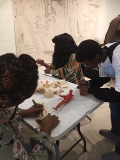 Renaissance Presbyterian Church summer camp trainees do artwork at the Association for Visual Arts. (Photo from Charlie Newton)