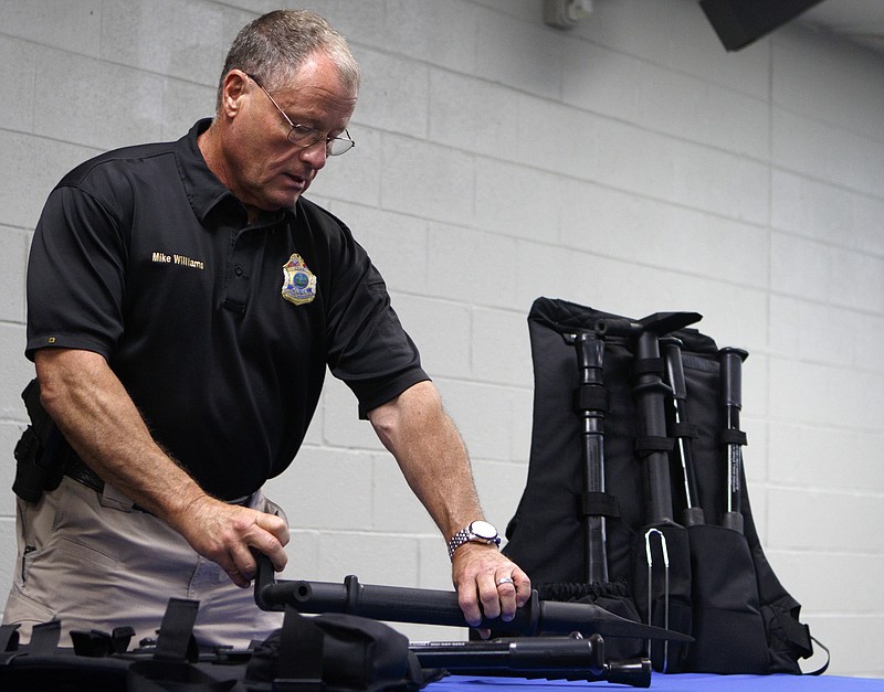 Signal Mountain Chief of Police Mike Williams sets down a Halligan bar while talking about the equipment in the "dynamic entry kits" during a press event at the Hamilton County Sheriff's Office West Patrol Annex on Thursday, June 7, 2018 in Hixson, Tenn. The Aegis Law Enforcement of Greater Chattanooga Inc. donated 34 of the kits to 10 local law enforcement agencies.