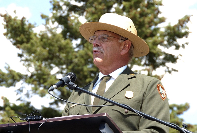 This August 17, 2017 file photo shows Yellowstone Superintendent Dan Wenk speaking at an event marking a conservation agreement for a former mining site just north of the park in Jardine, Mont. 