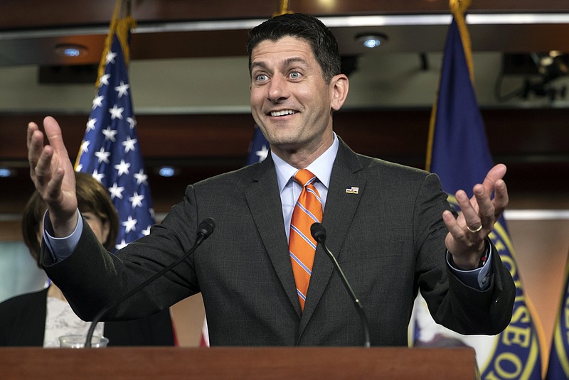  In this May 16, 2018 file photo, Speaker of the House Paul Ryan, R-Wis., has a light-hearted exchange with reporters at the start of a news conference on Capitol Hill in Washington. House GOP factions will meet with Ryan to try to resolve a looming immigration showdown. Ryan wants to halt legislation from centrists, and popular with Democrats, to provide young immigrants here illegally a path to legal status. (AP Photo/J. Scott Applewhite, File)