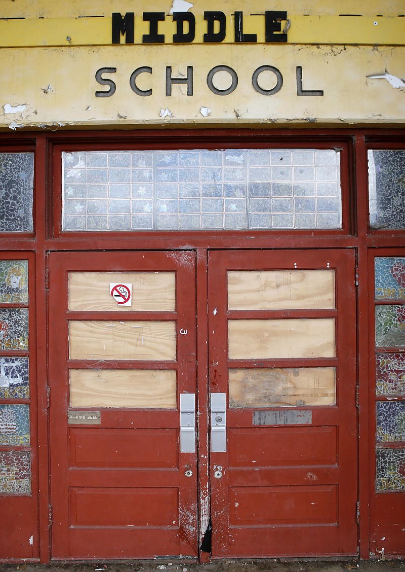 Doors to the former Howard Middle School are seen in the South Broad Street District on Tuesday, Feb. 20, 2018 in Chattanooga, Tenn.