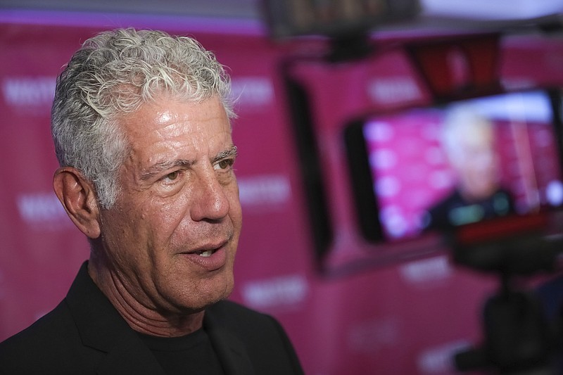 FILE - In this Oct. 5, 2017 file photo, Executive Producer and narrator chef Anthony Bourdain attends the premiere of "Wasted! The Story of Food Waste" at the Alamo Drafthouse Cinema in New York. Bourdain has been found dead in his hotel room in France, Friday, June 8, 2018, while working on his CNN series on culinary traditions around the world. (Photo by Brent N. Clarke/Invision/AP, File)

