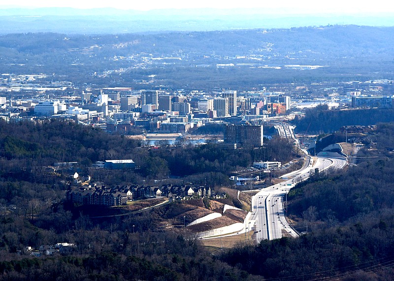 Downtown Chattanooga is seen from Signal Mountain in this file photo. A study published just a few months ago by economists at Stanford and Harvard universities says that cities like Chattanooga must address the factors stifling the economic mobility of African-American men if they want to see racial gaps narrow. / Staff file photo by Tim Barber