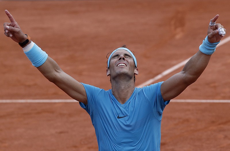 Rafael Nadal celebrates after beating Dominic Thiem 6-4, 6-3, 6-2 to win the French Open on Sunday in Paris. Nadal won the tournament for the 11th time in as many appearances in the final.