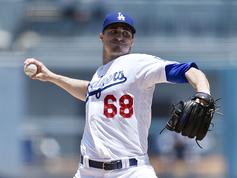 Los Angeles Dodgers starting pitcher Ross Stripling  delivers to Atlanta Braves Ozzie Albies  during the first inning of a baseball game in Los Angeles, Sunday, June 10, 2018. (AP Photo/Kelvin Kuo)