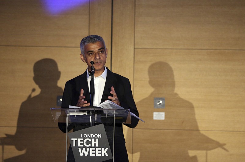 
              Mayor of London Sadiq Khan gives a speech during London Tech Week in London, Monday, June 11 2018. London Mayor Sadiq Khan says he hopes U.S. President Donald Trump will reconsider the protectionist measures that divided the G-7 summit in Canada last weekend. (AP Photo/Robert Stevens)
            