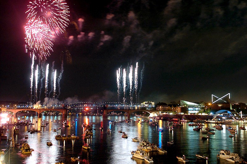 Fireworks explode over the Market Street Bridge during a previous Riverbend Festival finale.