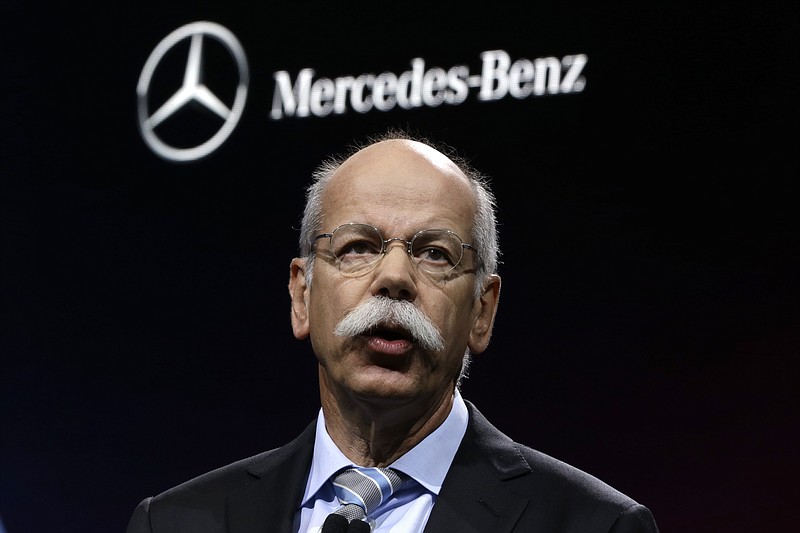 FILE - In this Jan. 14, 2013 file photo Dieter Zetsche, Chairman of the Board of Management of Daimler AG, Head of Mercedes-Benz Cars speaks at media previews for the North American International Auto Show in Detroit. Germany's transport minister said the government is ordering automaker Daimler to immediately recall 238,000 vehicles equipped with software that turns off emissions controls under certain conditions. (AP Photo/Paul Sancya, file)