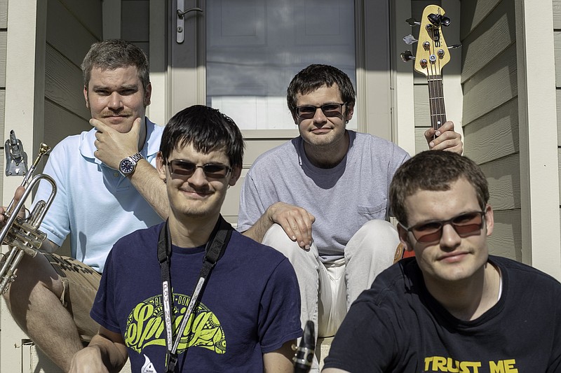 Front from left are Paul Newton, who plays saxophone, and Mitch Newton, drummer. Back from left are Tyler Benson, on trumpet, and Edward Newton, who plays the electric bass. (Contributed Photo)