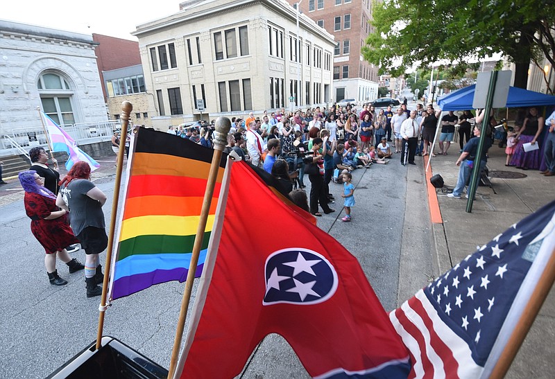 Dozens gather outside City Hall during Tuesday night's vigil for the Chattanooga LGBTQ community remembering local victims, and the Pulse Nightclub shootings.