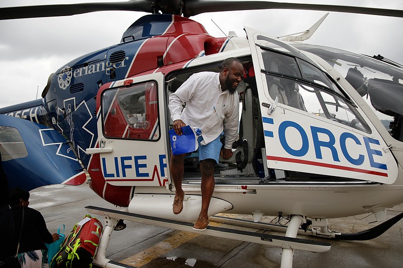 Howard educator Henry Oston tours a Life Force helicopter at Erlanger Hospital on Wednesday, June 13, 2018, in Chattanooga, Tenn. Teachers from Howard and other schools which will launch Future Ready Institutes in the fall spent the week participating in externships at business partners across the region.