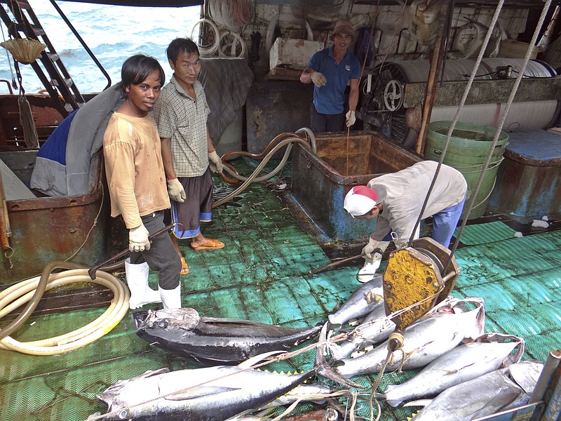 Fishermen at the Majuro port in the Marshall Islands unload yellowfin tuna on Feb. 1, 2018, for Luen Thai Fishing Venture, one of the companies that was supplying fish that entered the supply chain of Sea To Table. 