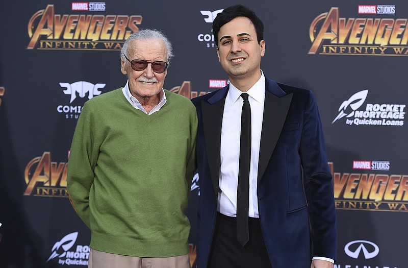 FILE - In this April 23, 2018 file photo, Stan Lee, left, and Keya Morgan arrive at the world premiere of "Avengers: Infinity War" in Los Angeles.