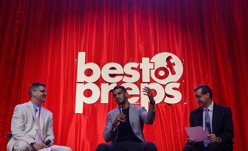 Times Free Press sports editor Stephen Hargis, left, and sports writer David Paschall interview Tennessee Titans quarterback Marcus Mariota during the Best of Preps banquet at the Chattanooga Convention Center on Thursday, June 14, 2018 in Chattanooga, Tenn.