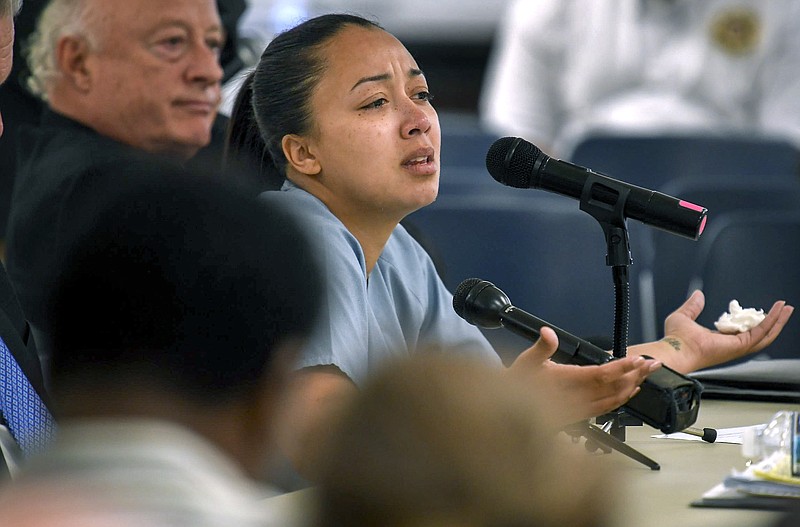 FILE - In this May 23, 2018 file photo, Cyntoia Brown appears in court during her clemency hearing at the Tennessee Prison for Women in Nashville, Tenn. Attorneys for the Tennessee woman serving a life sentence for killing a man when she was 16 are asking federal appellate judges to throw out her sentence, in a case that has attracted celebrity attention. Brown's attorneys will argue Thursday, June 14 before a 6th U.S. Circuit Court of Appeals panel. (Lacy Atkins/The Tennessean via AP, Pool)

