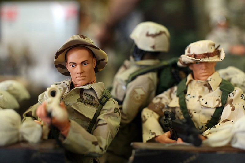 G.I. Joe figures are seen in a diorama at a G.I. Joe Collectors Club show in Batavia, Ill. The club will have its 25th anniversary convention in Chattanooga Thursday through Sunday, with Saturday and Sunday open to the public.