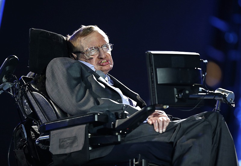 
              FILE - In this Aug. 29, 2012 file photo, British physicist, Professor Stephen Hawking during the Opening Ceremony for the 2012 Paralympics in London.  Hawking will take his place among Britain's greatest scientists when his ashes are buried in Westminster Abbey, Friday June 15, 2018, between the graves of Charles Darwin and Isaac Newton, during a service of thanksgiving for the physicist who died in March 2018. (AP Photo/Matt Dunham, File)
            