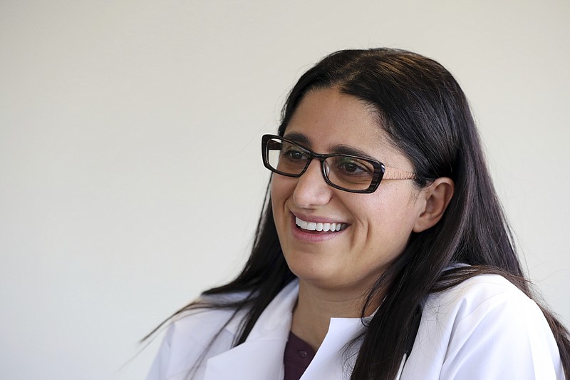 In this Thursday, May 17, 2018 photo, Dr. Mona Hanna-Attisha is interviewed in Flint, Mich. 