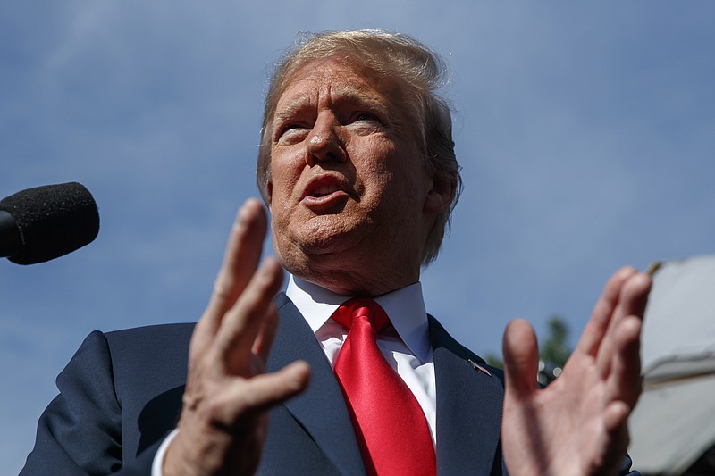 President Donald Trump speaks to reporters at the White House, Friday, June 15, 2018, in Washington. (AP Photo/Evan Vucci)

