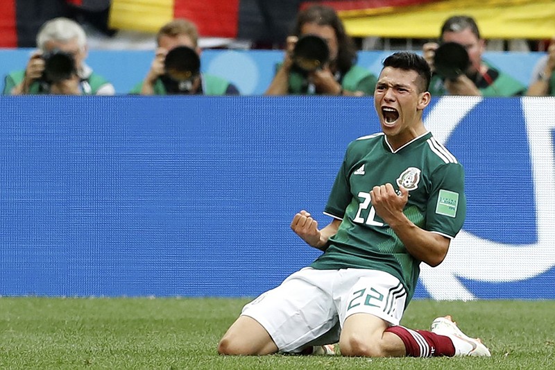 Mexico's Hirving Lozano celebrates after scoring in the 35th minute of his country's 1-0 win against Germany in their World Cup Group F opener Sunday in Moscow. Mexico beat Germany, the 2014 World Cup champion, for the first time in a competitive match.