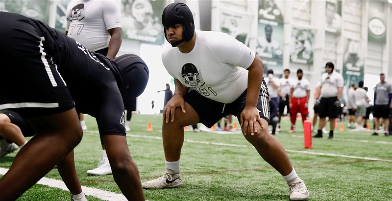 Offensive tackle Xavier Truss, right, of Warwick, Rhode Island, committed Sunday to play at Georgia. The 6-foot-8, 350-pounder is in the 2019 signing class, and his pledge pushed the Bulldogs into the top five of the 247Sports.com composite team rankings.