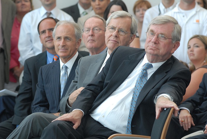 Staff file photo by John Rawlston Hamilton County Mayor Claude Ramsey, far right, sits with other Chattanooga officials on July 15, 2008, as Volkswagen announces it will build a vehicle assembly plant in Chattanooga.