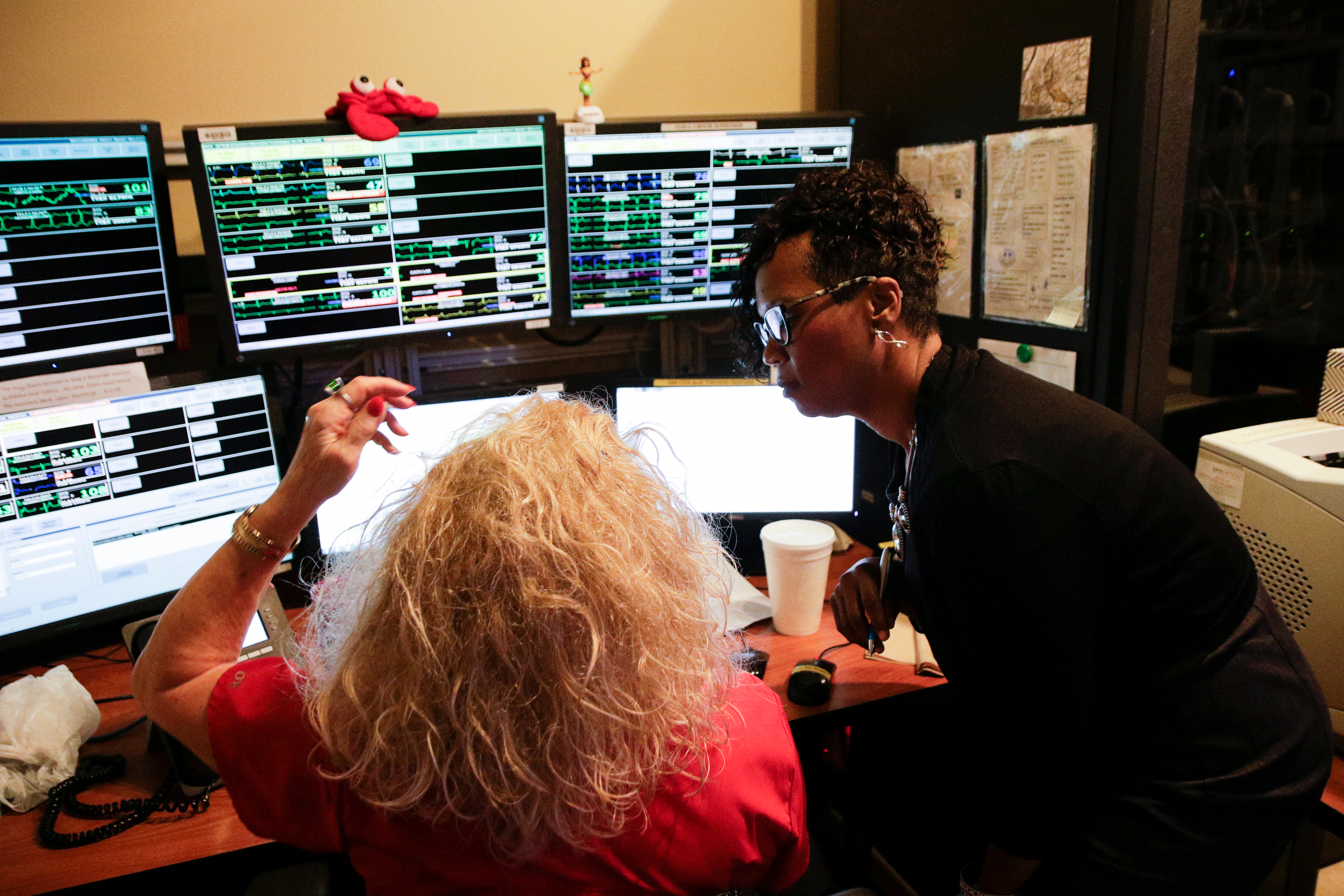 Howard principal Leandrea Ware, right, asks monitor technician Pam Charlesworth about her job during a tour at Erlanger Hospital on Wednesday, June 13, 2018, in Chattanooga, Tenn. Teachers from Howard and other schools which will launch Future Ready Institutes in the fall spent the week participating in externships at business partners across the region.