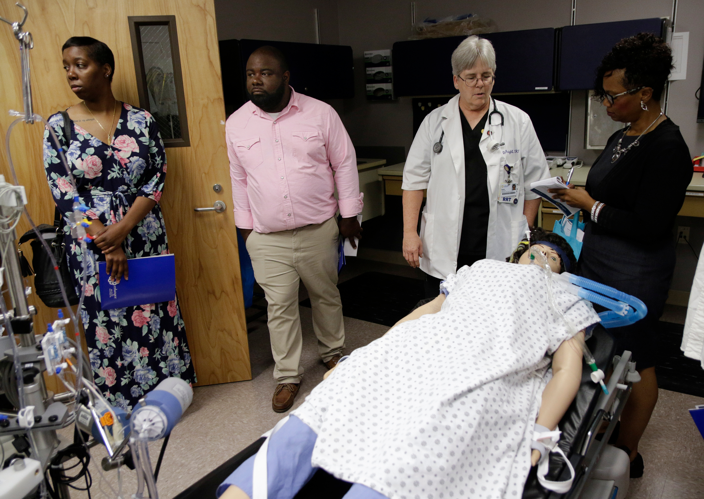 Respiratory therapist Diane Knight, center right, explains her job to Howard educators Lakesha Thompson, James Talley, and Leandrea Ware, from left, during a tour at Erlanger Hospital on Wednesday, June 13, 2018, in Chattanooga, Tenn. Teachers from Howard and other schools which will launch Future Ready Institutes in the fall spent the week participating in externships at business partners across the region.