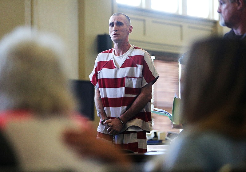 Robert William Ellis quietly tells family members that he loves them as he is walked out of the courtroom following his sentencing hearing in the Walker County Superior Court in LaFayette, Georgia, Tuesday, June 19, 2018. A jury convicted Ellis of malice murder two weeks ago, and he was sentenced to life in prison with no chance of parole on Tuesday.