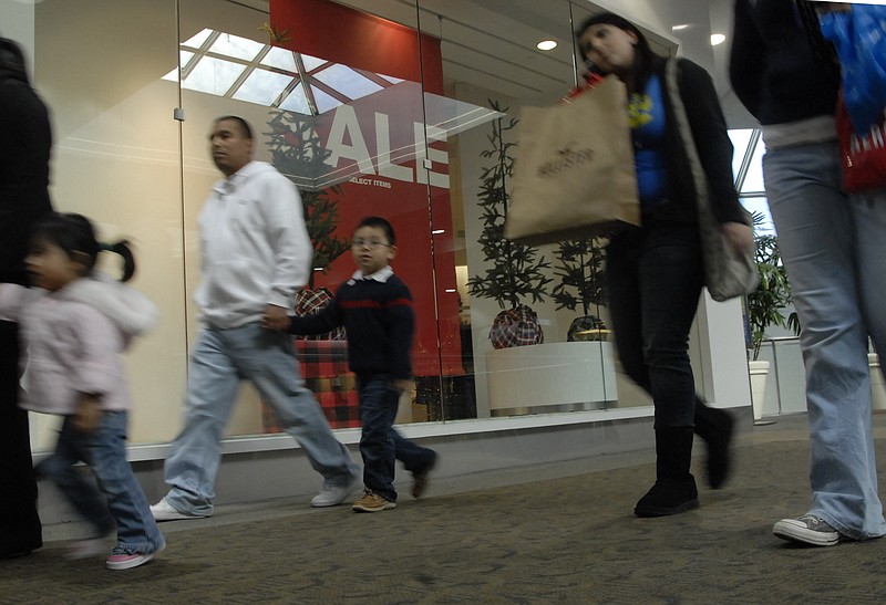 Staff file photo / Shoppers walk through Hamilton Place mall, Chattanooga's largest mall, in East Brainerd.