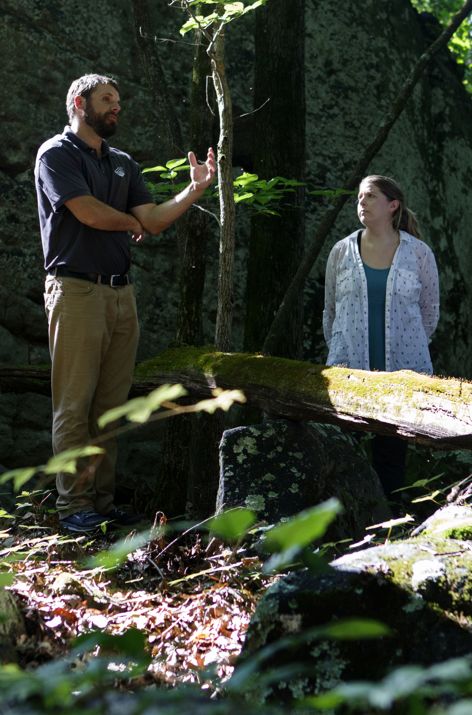 North Chickamauga Creek Conservancy Executive Director Tim Laramore, left, and The Land Trust for Tennessee Conservation Project Manager Rachael Bergmann speak with the Times Free Press while touring the land below W Road on Tuesday, June 19, 2018 in Signal Mountain, Tenn. The area of land would be the first park in the county to have downhill mountain biking, bouldering and hiking on the same property.