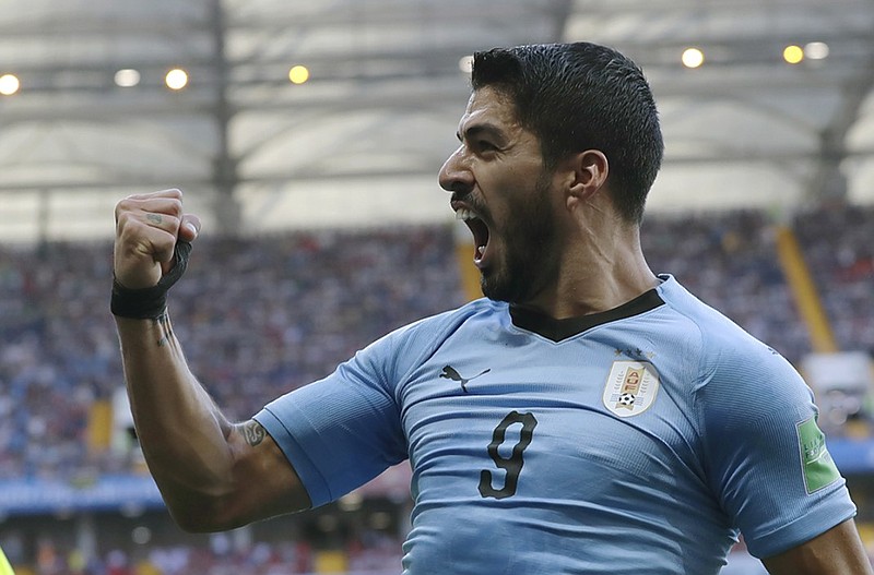 Uruguay's Luis Suarez celebrates after scoring in Wednesday's 1-0 World Cup victory against Saudi Arabia in Rostov-on-Don, Russia. The win settled the Group A standings, pushing Russia and Uruguay into the knockout phase but eliminating Egypt and Saudi Arabia from contention.