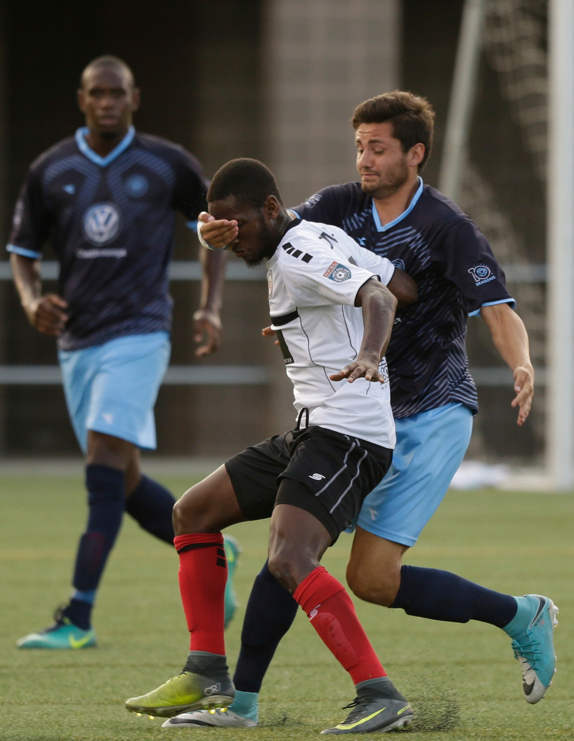 CFC's Daniel Valenciano, right, pressures Atlanta's Kebba Demba during Chattanooga FC's soccer match against the Atlanta Silverbacks at Finley Stadium on Wednesday, June 20, 2018, in Chattanooga, Tenn.